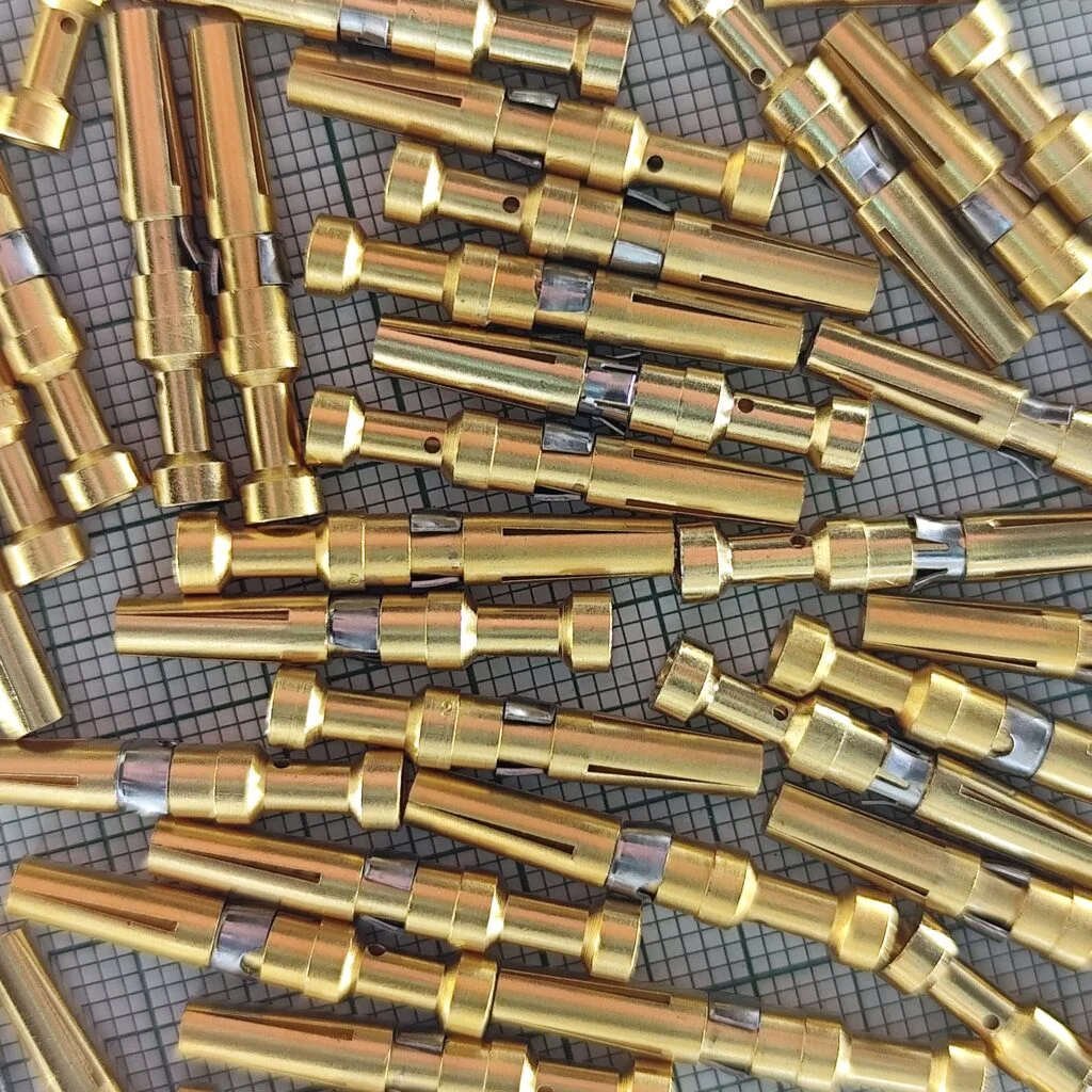 Gold-plated military pins for scrap gold recovery